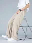 Calça Masculina Business Casual 8XL — Corte Reto em Poliéster Leve, Modelagem Solta e Cós Elástico