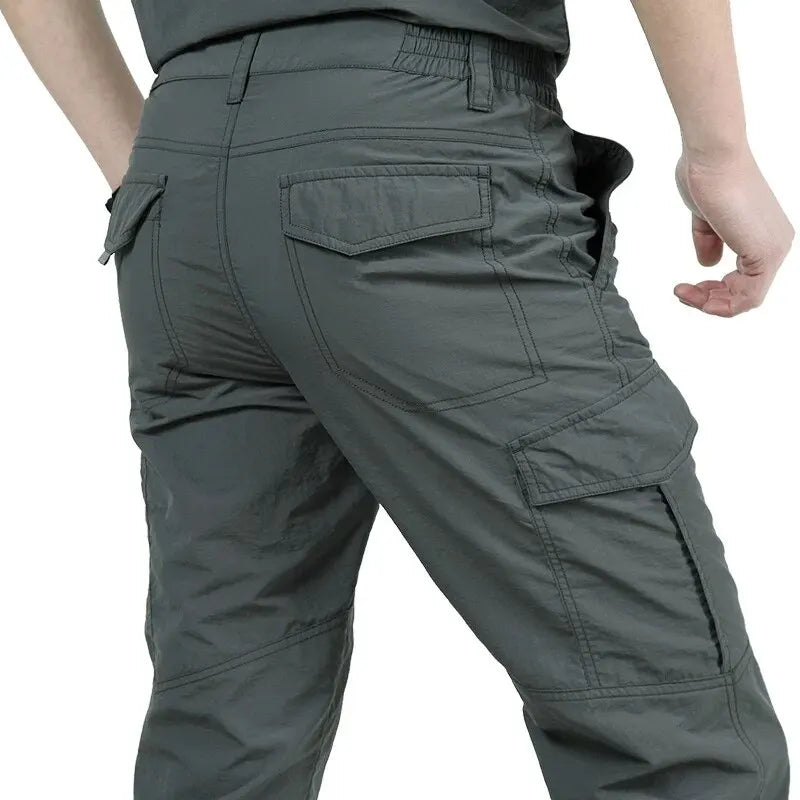 Calça Masculina Tática Cargo | Impermeável, Multibolsos, Alta Resistência – Uso Outdoor e Urbano
