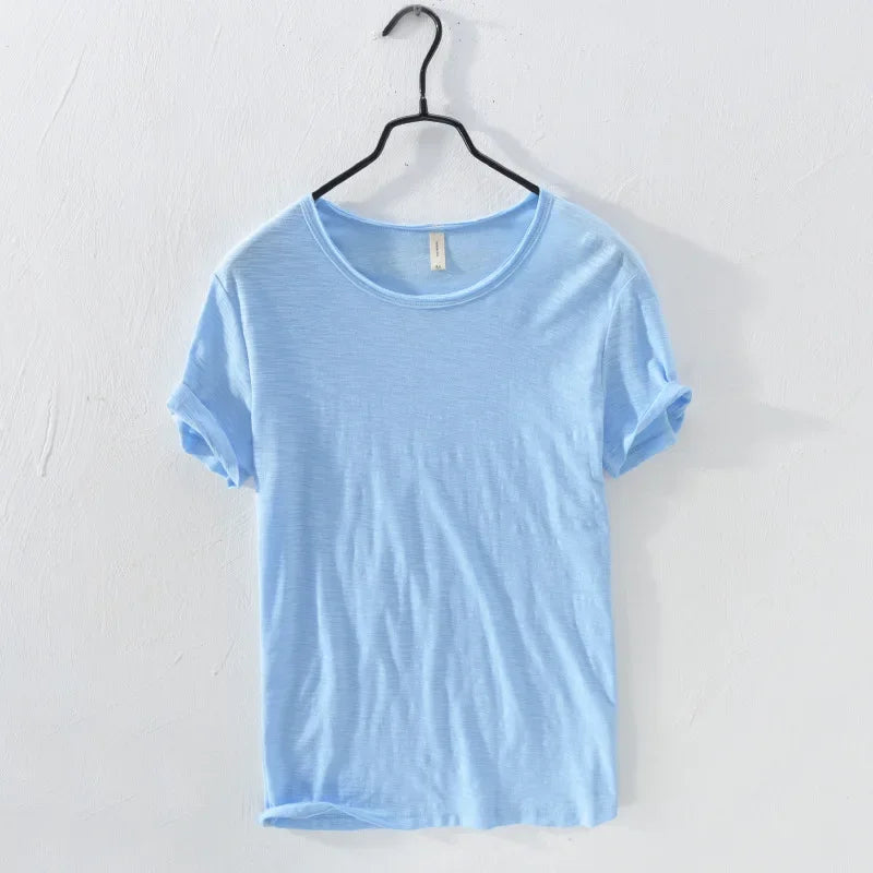Camiseta Masculina Slim Fit em Algodão Puro — Edição Monocromática com Acabamento Raw Edge e Linha Essencial
