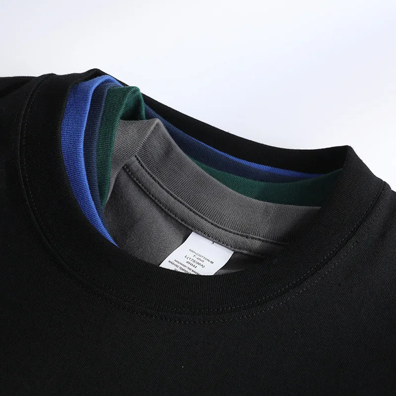 Camiseta Unissex em Algodão Puro – Modelagem Solta, Gola Redonda e Estrutura Densa em Branco Sólido