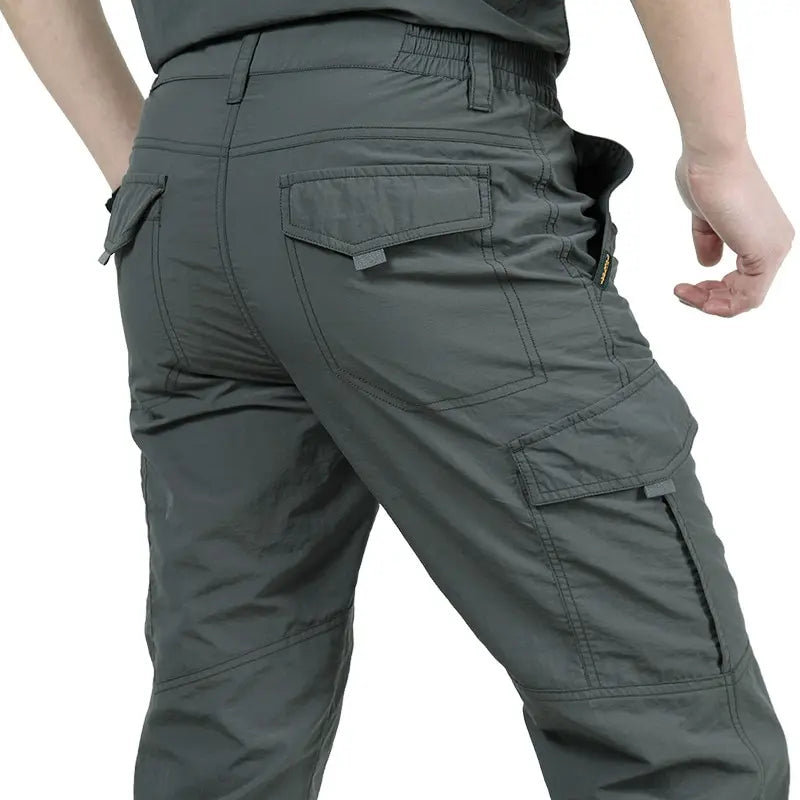 Calça Masculina Tática Cargo | Impermeável, Multibolsos, Alta Resistência – Uso Outdoor e Urbano