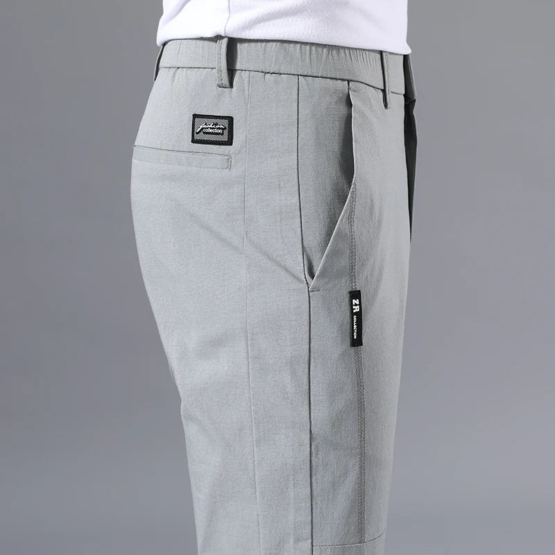 Calça Masculina Slim Fit 2025 — Chino Clássica com Elasticidade, Corte Coreano e Tecidos Leves para Verão