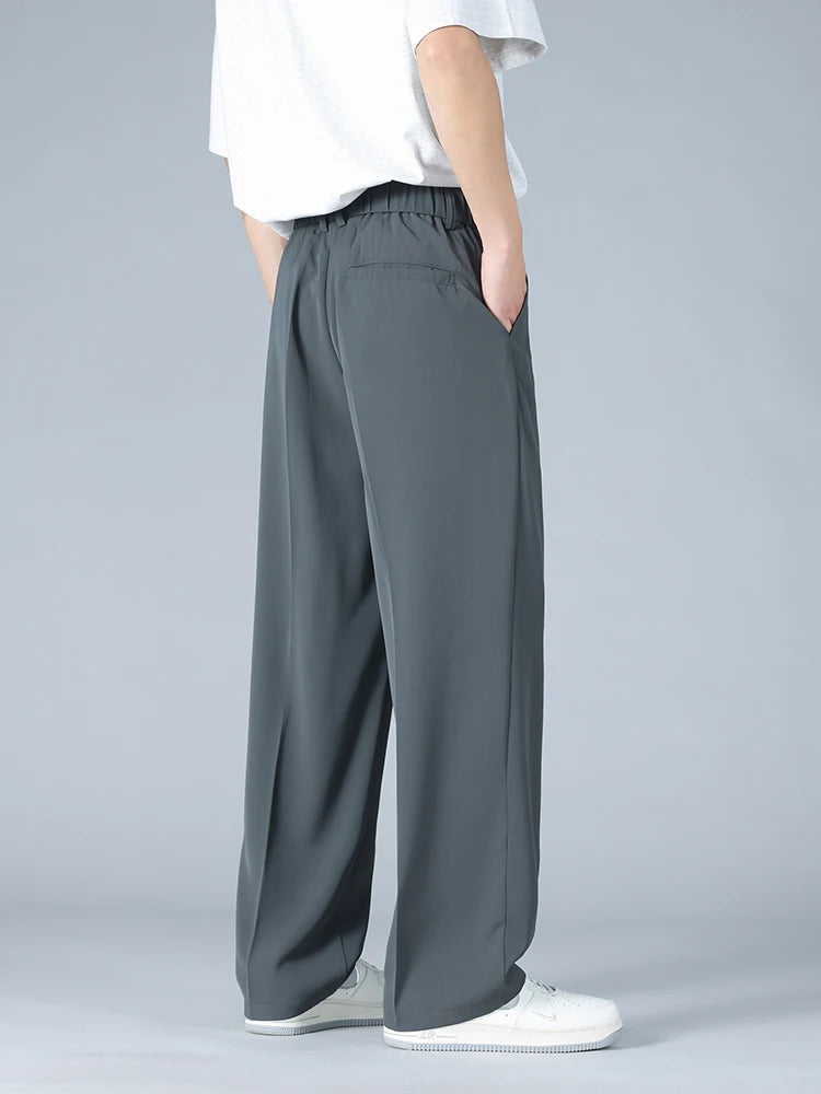 Calça Masculina Business Casual 8XL — Corte Reto em Poliéster Leve, Modelagem Solta e Cós Elástico