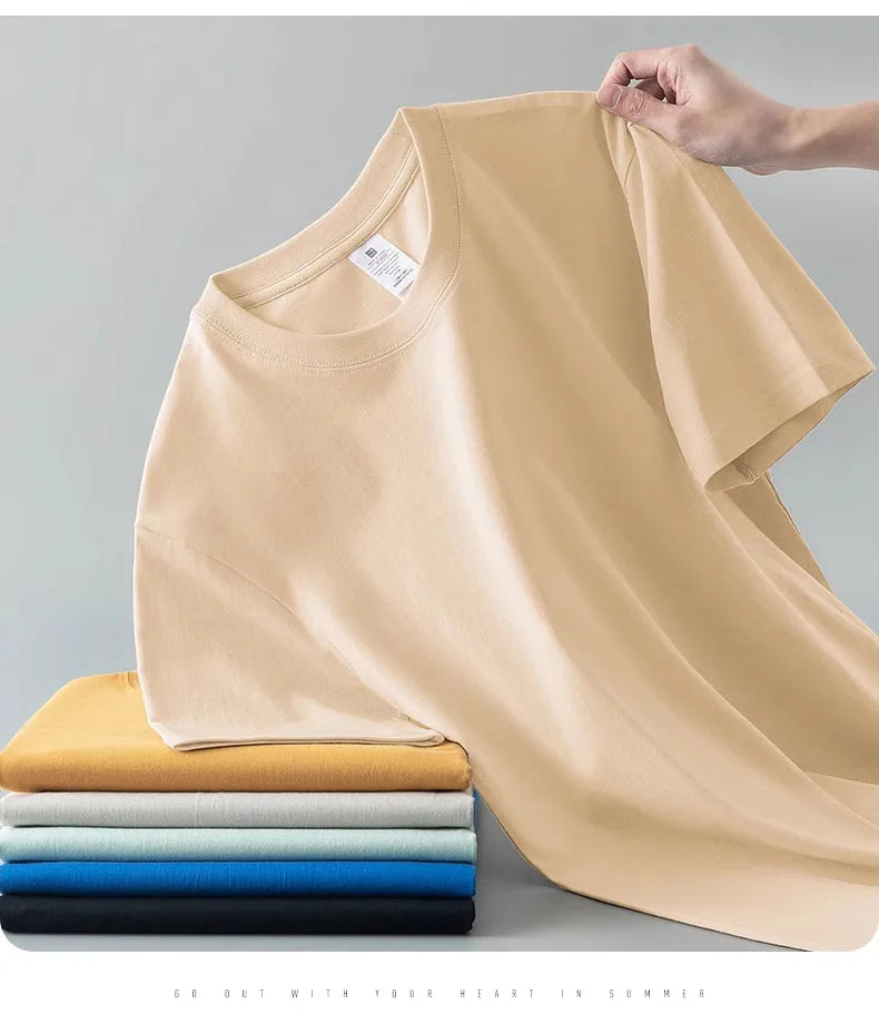 Camiseta Unissex em Algodão Puro – Modelagem Solta, Gola Redonda e Estrutura Densa em Branco Sólido